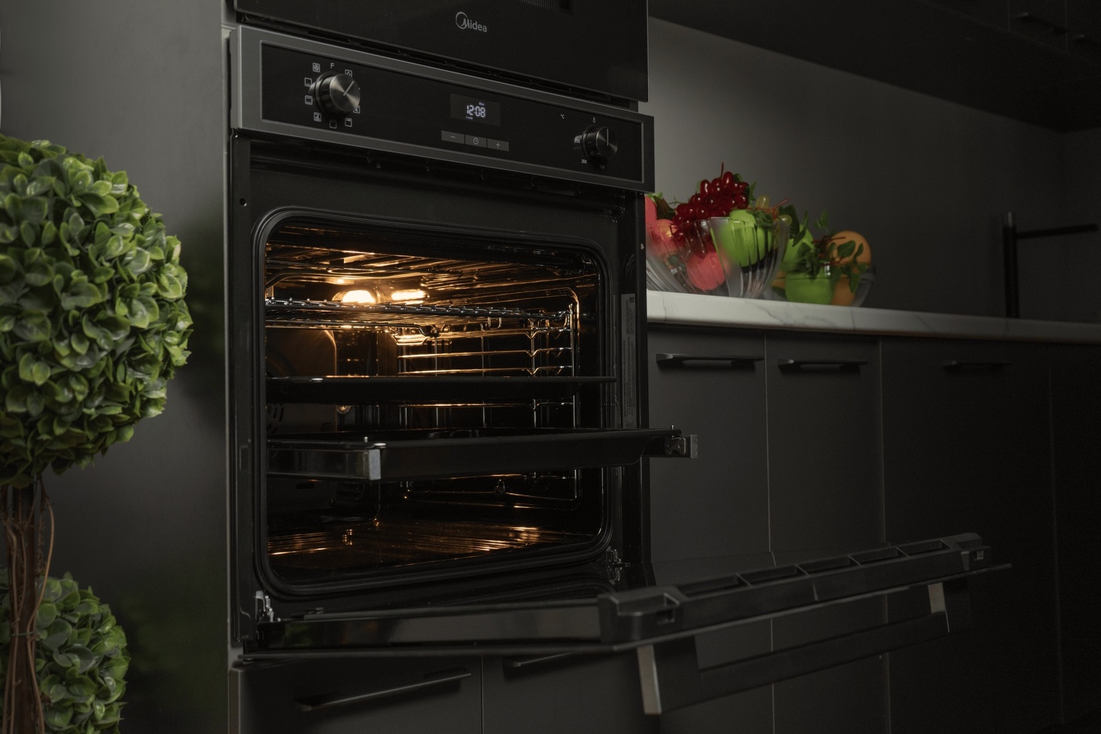 Духовой шкаф Midea MO72105X черный, стальной