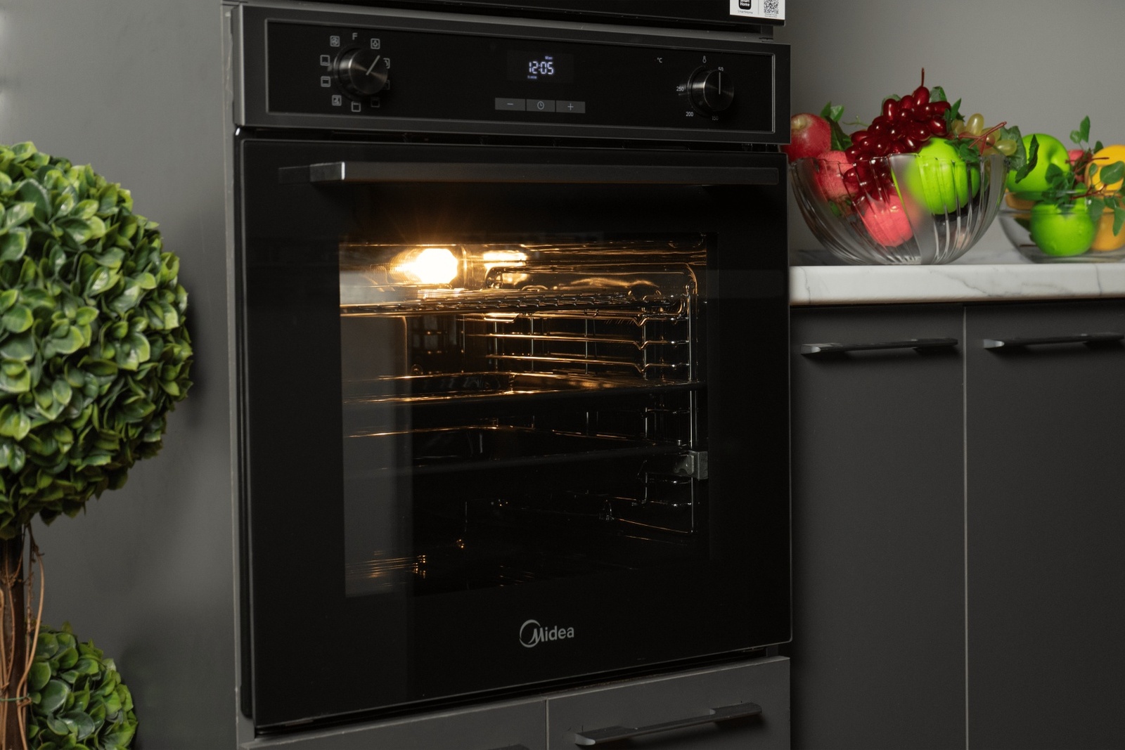 Духовой шкаф Midea MO72105X черный, стальной